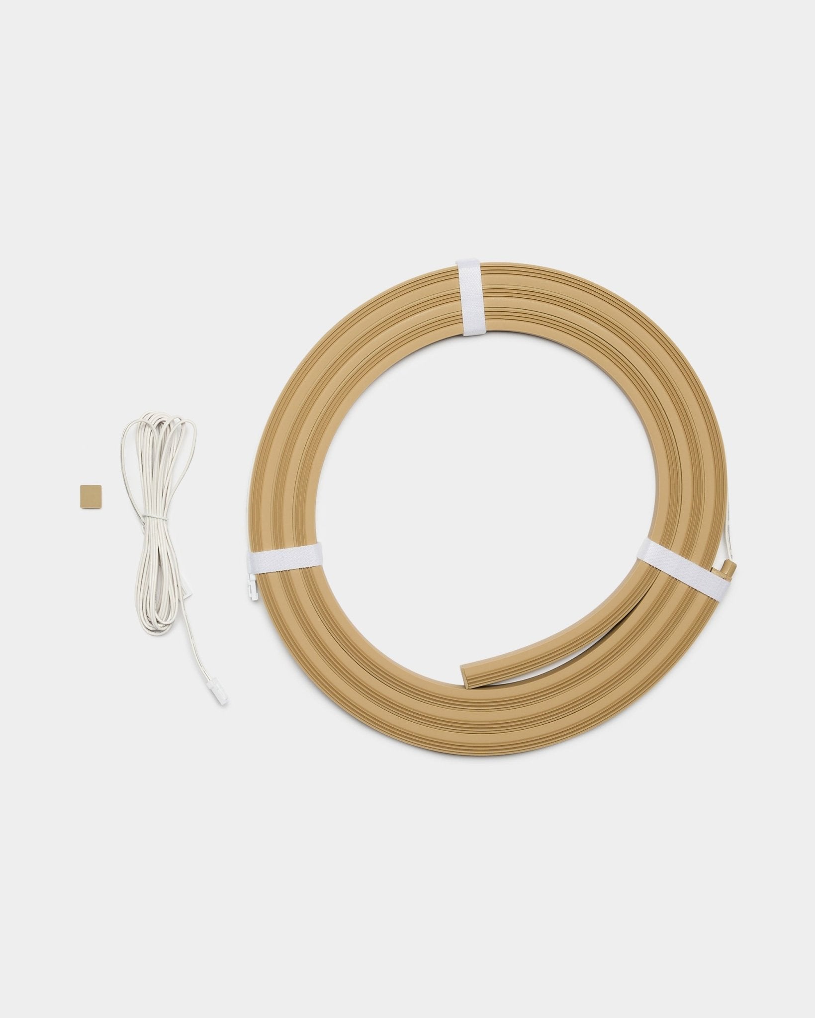 Tira LED WoodUpp Lumi en beige, de 240 cm de longitud, diseñada para integrarse con los paneles acústicos Akupanel u otros proyectos LED de WoodUpp.