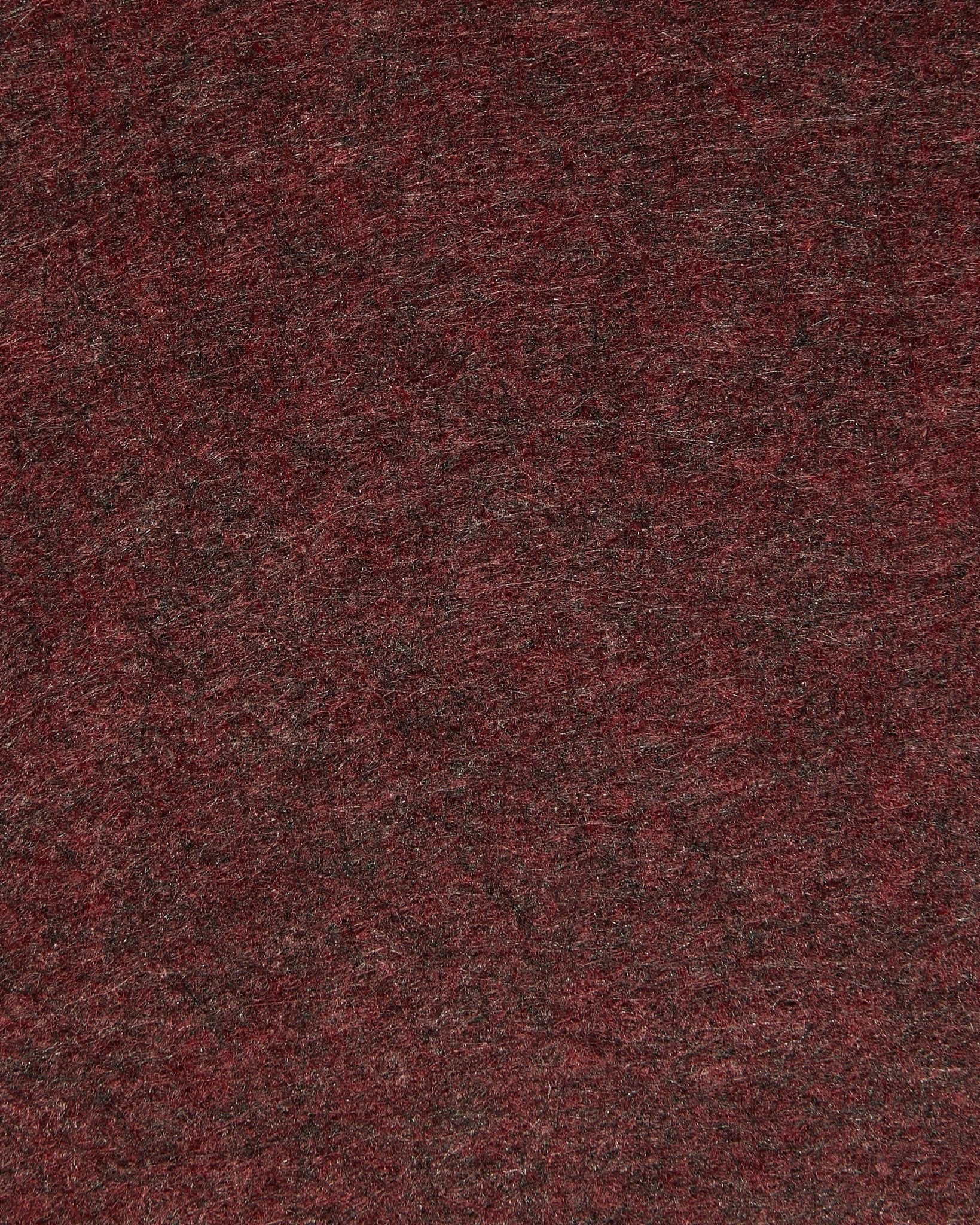 Primer plano de WoodUpp Vigg | Felt Box / BM2 en ox red, destacando el fieltro acústico texturizado con un sombreado sutil y fibras visibles.